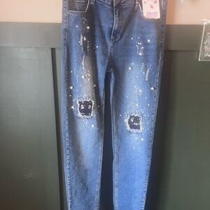Chic Distressed Denim Women's Jeans with gem and pearl accents